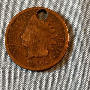 1906 Indian penny with hole in it Someone put a hole in it for a necklace